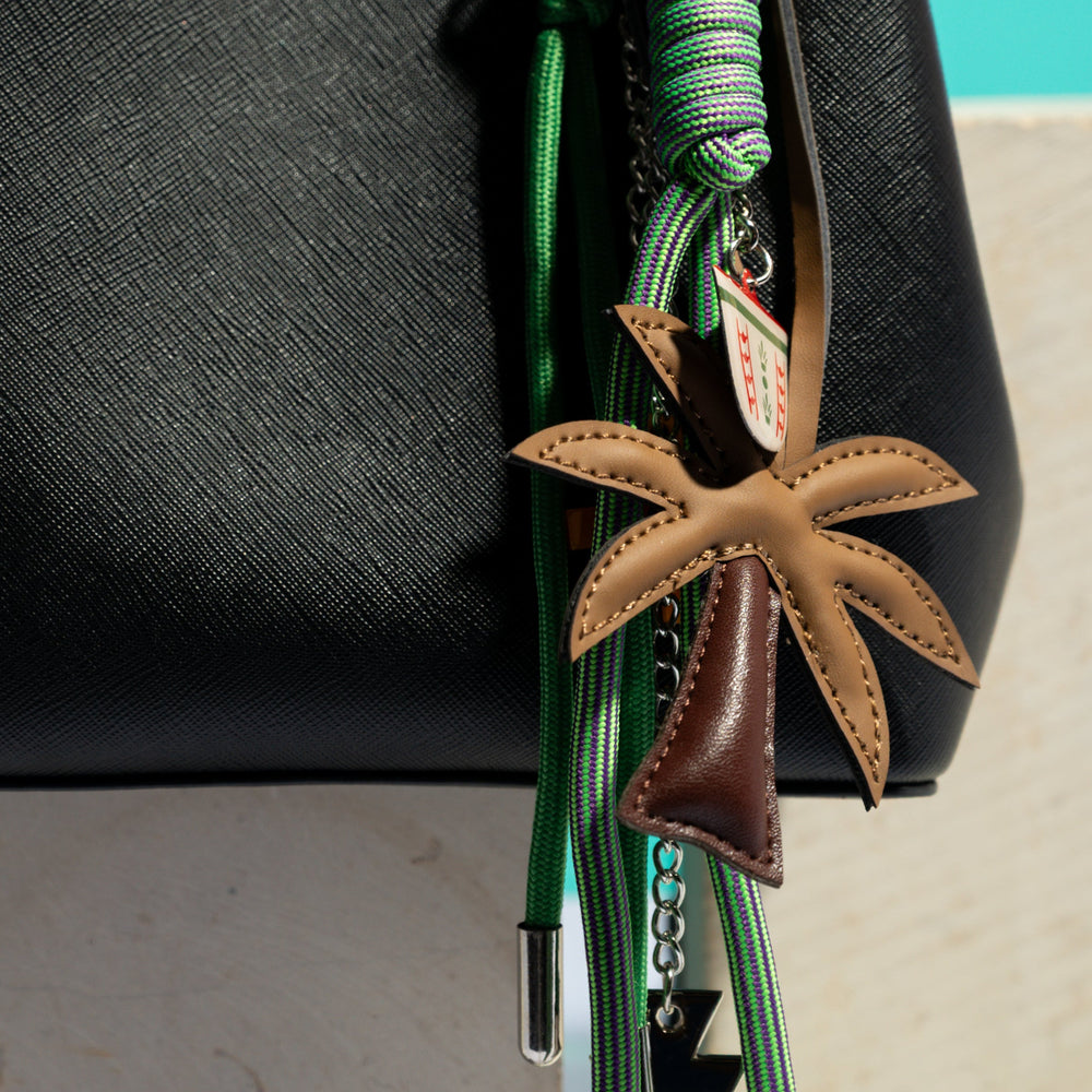 
                      
                        Finjal - Bag Charm
                      
                    