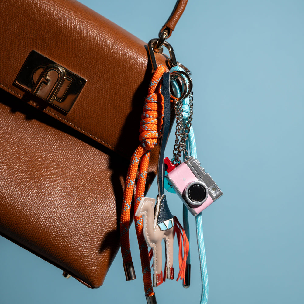
                      
                        Waneet - Bag Charm
                      
                    